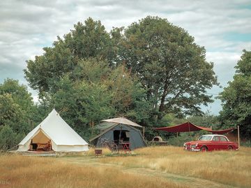 The view of the Orwell Bell Tent with the communal army tea tent behind