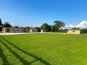Private lawn for the huts