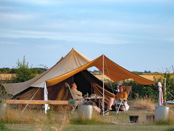 add electric to your large family tent & an awning as an extra for good measure