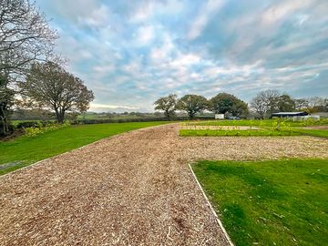 Hardstanding and grass pitch