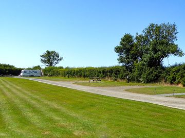 View over to hardstanding and grass pitches