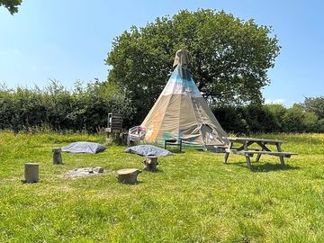 Tipi with a campfire area