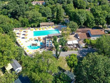 View of the swimming pool, paddle pool and spa