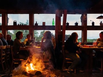 Every evening at 21:00 we turn on the fire in the common room