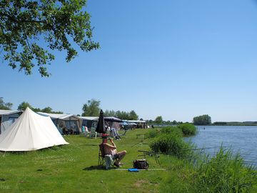Camp by the lake and fish from your pitch