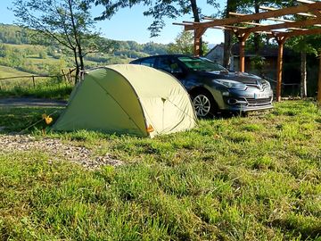 Tent pitch with hill views