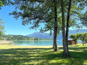 The lake with mountains in the background