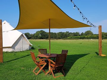 Outside each bell tent