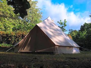 Tipi in a shaded spot