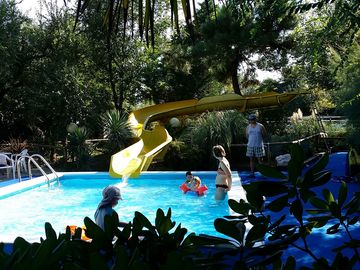 Swimming pool with waterslide