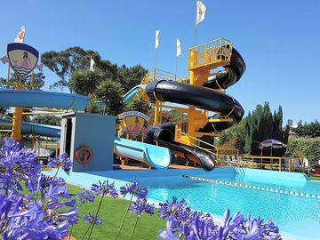 Swimming pool with slides