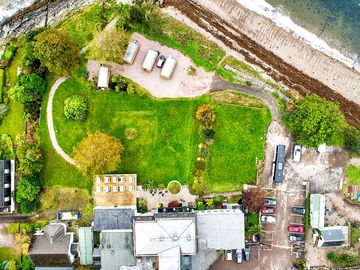 Aerial view of the hotel and pods