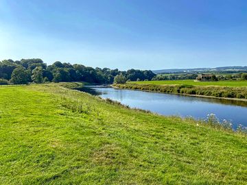 River running along the site