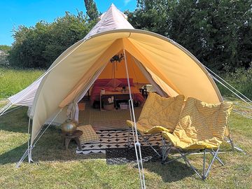 View into fully furnished bell tent