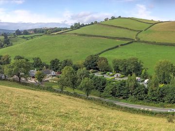 View of the site from hill, plenty of open green space on site