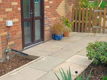 Outside area leading to new entrance to facilities building