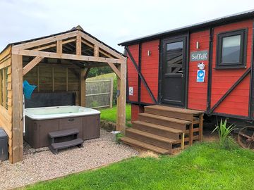 Private 6-seater electric hot tub outside the hut