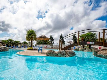 Bridge to the 'island' in the middle of the outdoor pool