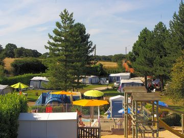 Grass pitches with trees all around