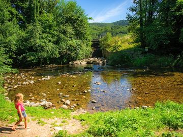 By the river