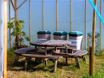 Communal area with benches and bins