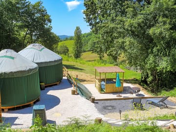Double yurt with covered jacuzzi