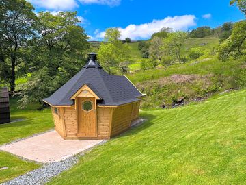 The hobbit house, a communal area for all guests with seating, games and a central firepit