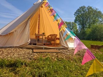 Bunting outside the bell tent