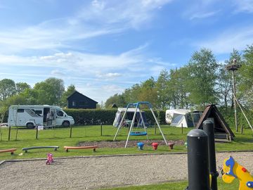 Playground with camping pitches