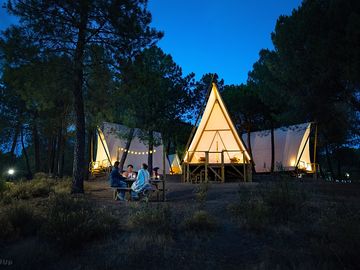 Tipis at night