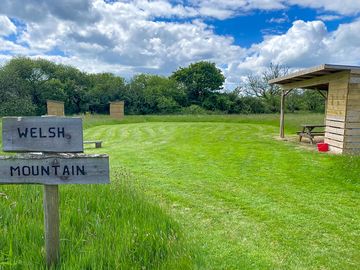 Spacious pitches with cooking shelter & compost loo