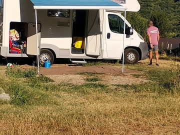 Motorhome pitch with space for an awning