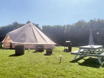 Bell tent, fire pit, chairs, bench and gas’s bbq all provided