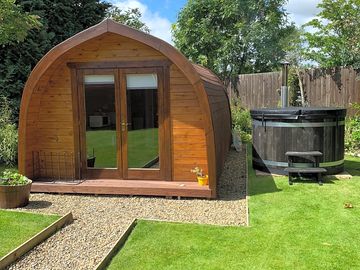 Camping pod with private wood fired hot tub