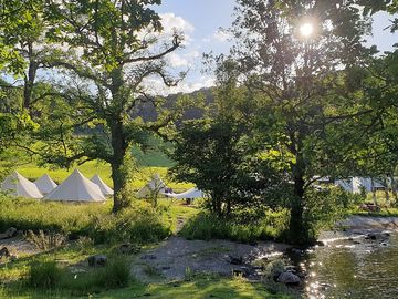 Bell tents by the lake