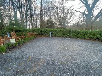 Pitches divided by neat hedges