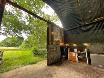 Honesty shop with fresh eggs, wood, cooking tripods for hire, plus communal freezer and charging.