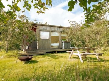 The retreat hut is nestled into one of our orchards