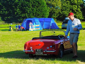 Cars are allowed by tents