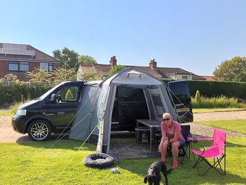 Our pitch, level hard standing for the van and short grass for the awning - perfect.