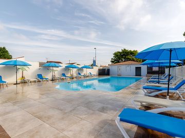 Pool and sundeck with loungers