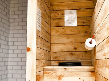 Inside the shared toilet/shower trailer. photo taken by boutique camping.