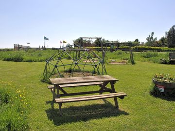 Somewhere to sit while the kids play.