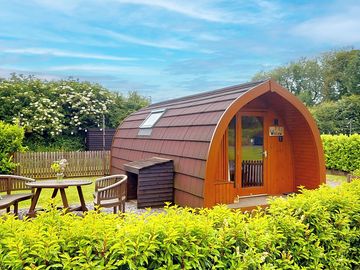 Secure enclosed gardens around the pods