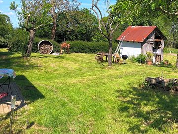 Barbecue, outdoor seating area and utilities area