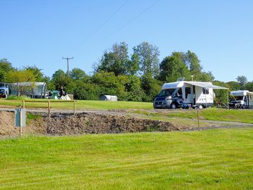 Caravans parked up enjoying the weather and surroundings