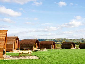 Wigwams with picnic benches