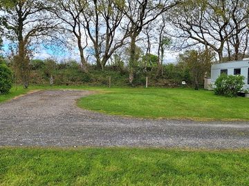 Badger's Den pitch, part hardstanding and part grass