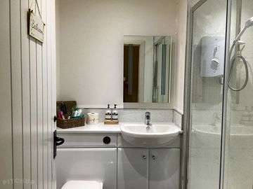 There is a shower room up near the house for guests from the gypsy van and the shepherd's hut to use