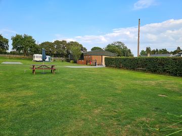 Toilet/shower block in distance